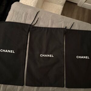 CHANEL Black Drawstring Bags